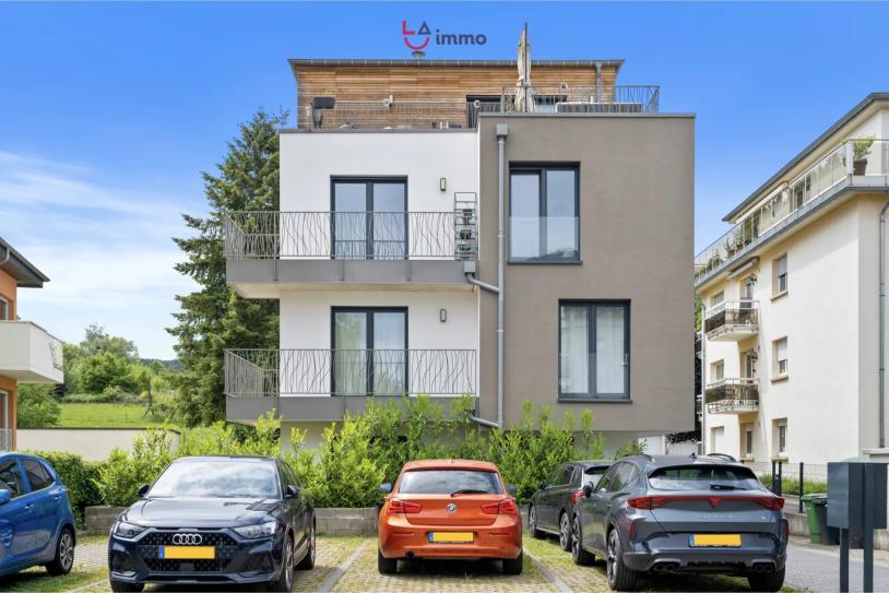 Duplex élégant dans résidence 2021 avec terrasse et parking extérieur - Image #1