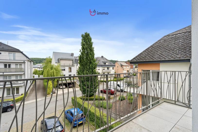 Duplex élégant dans résidence 2021 avec terrasse et parking extérieur - Image #11