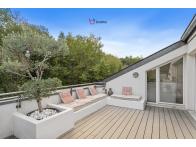 Duplex inversé d’exception avec terrasse et vue sur les bois - Image #2