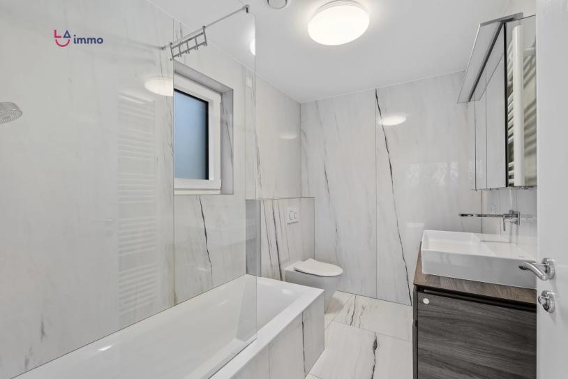 Appartement lumineux et moderne en rez-de-jardin - Image #7