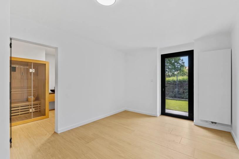 Exceptional 3-Bedroom Apartment with Home Office, Private Garden and Sauna in Strassen - Image #21 Exceptional 3-Bedroom Apartment with Home Office, Private Garden and Sauna in Strassen - Image #21